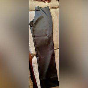 Sara Campbell This classic, slim fitting stretch satin black pant.  Size 10